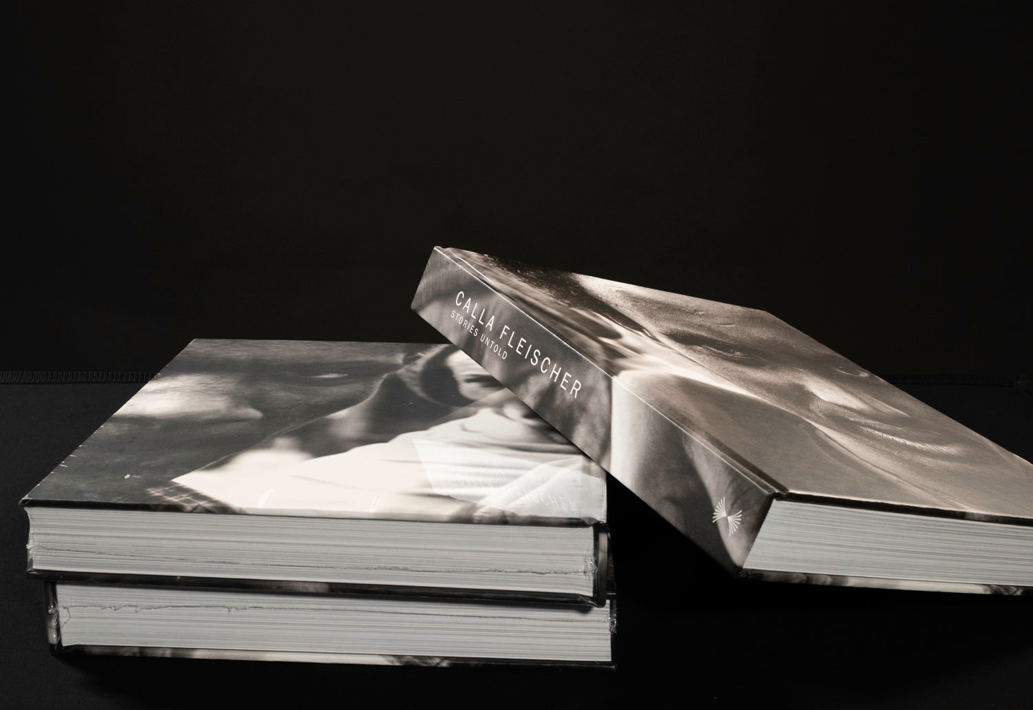 Three "Stories Untold" books stacked.